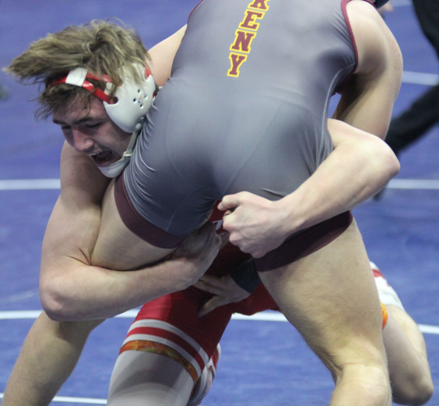 Summers reaches the podium